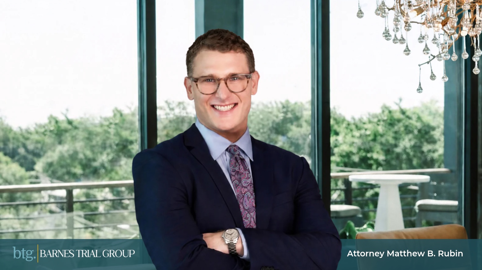 Professional portrait of Matthew B. Rubin, attorney at Barnes Trial Group in the large conference room.
