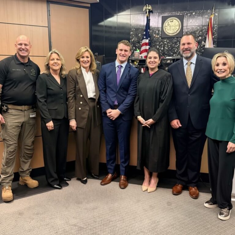 Matthew B. Rubin takes the oath during his Florida Bar swearing-in ceremony in a courtroom, marking the start of his legal career as an attorney.